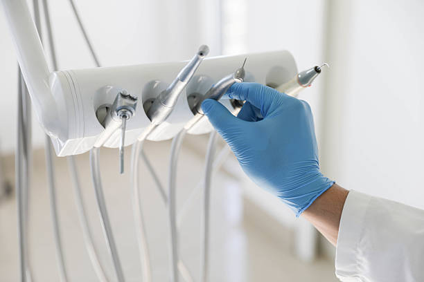 Professional Dental Implants technician working in Flower Hill, NY